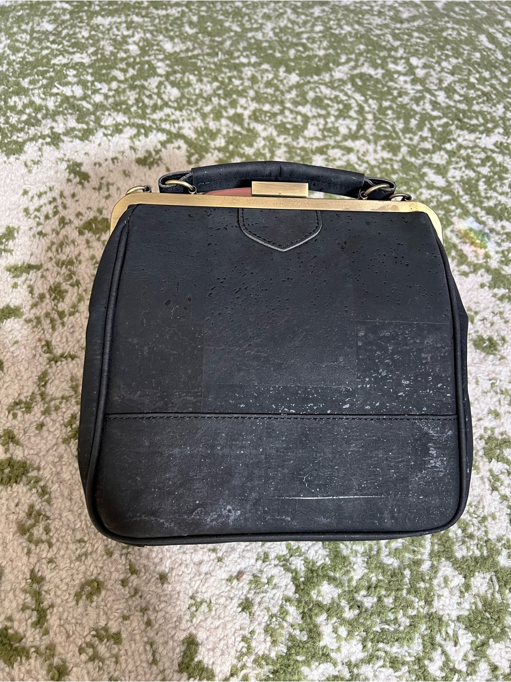 Black Crossbody Bag with Gold Frame and Top Handle